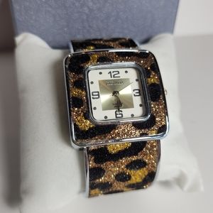 Vintage Strada gold and black animal print cuff watch white face
